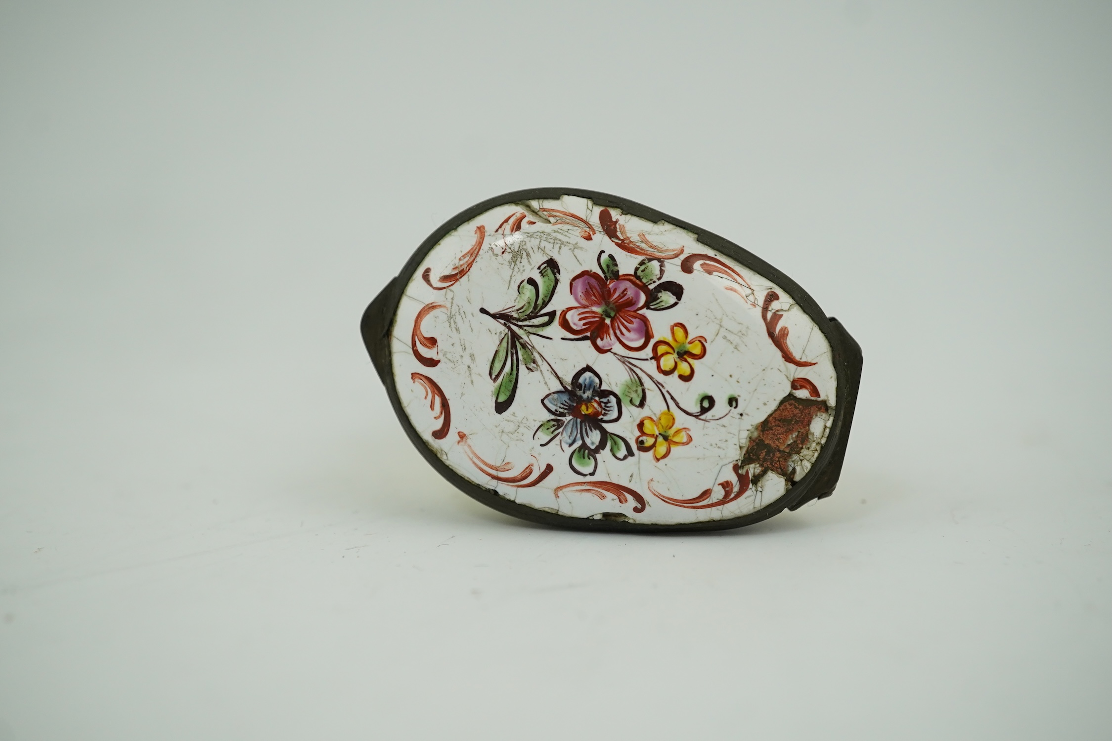 An 18th century South Staffordshire (Bilston) enamel box modelled as a canary with floral decorated lid, 4.5cm high. Condition - fair/poor